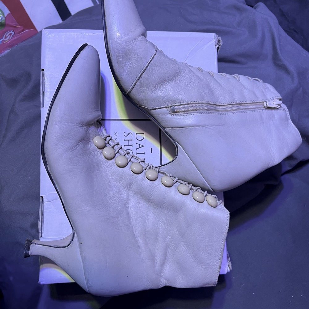 Vintage leather cream colored Victorian boots. Brand unknown, in good condition.